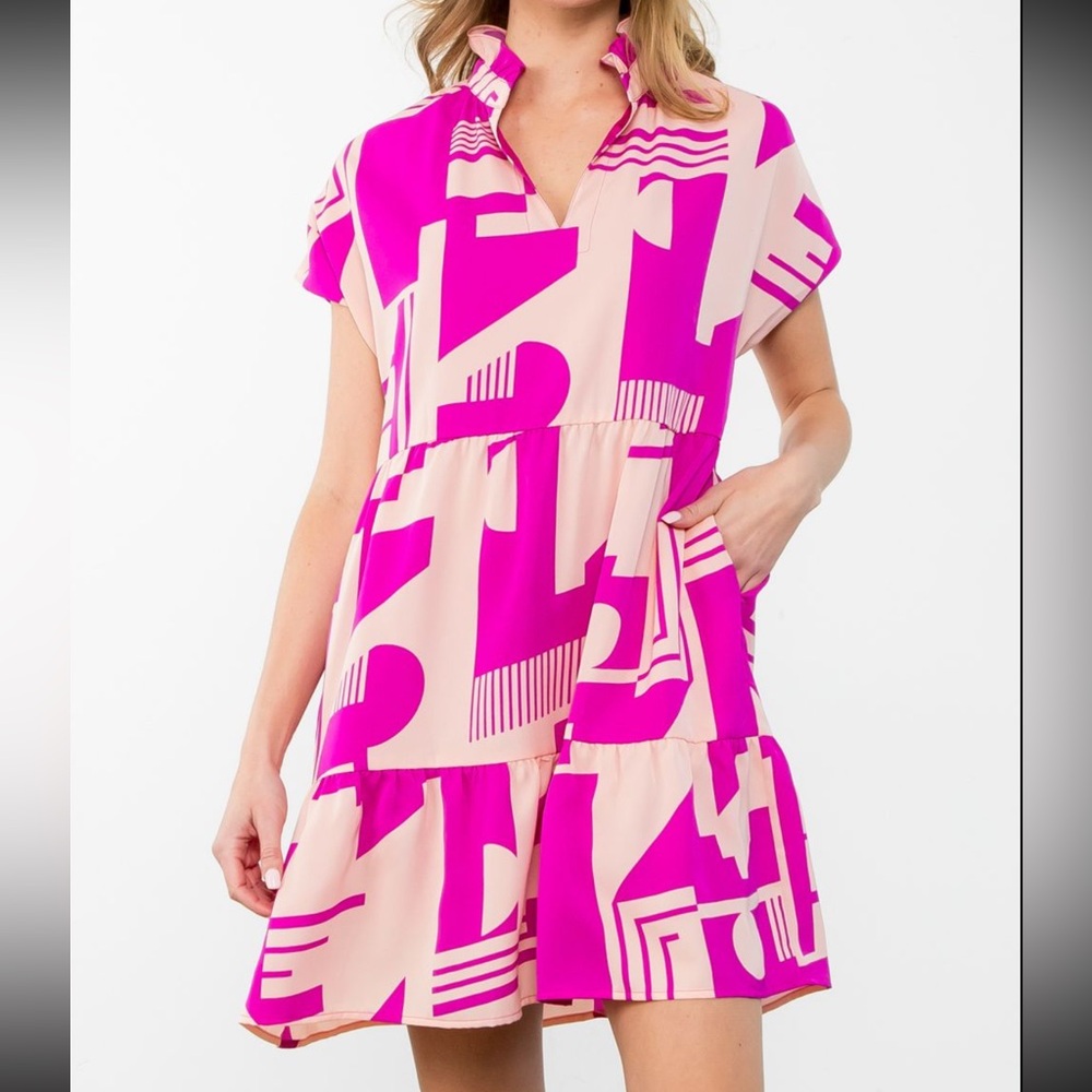 New with tags! Magenta patterned dress from THML. Flowy w pockets.Multiple sizes